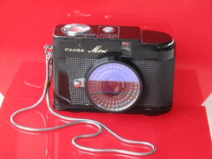 Fujica mini cámara de medio marco con cadena, VENDEDOR DE EE. UU. "LQK" - Imagen 1 de 4