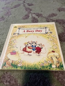 Cyndy Szerkeres’ tiny paw library a busy day by golden - Picture 1 of 3