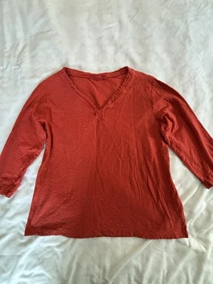 Top suelto corte para mujer grande cuello en V naranja quemado pulóver algodón/lino Foto 1 de 4