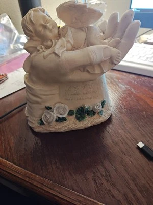 Resin Statue Hand Holding Baby Angel - Image 1 of 2