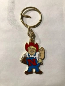 LLAVERO UNIVERSITARIO DE NEBRASKA "HERBIE HUSKER" - Imagen 1 de 1