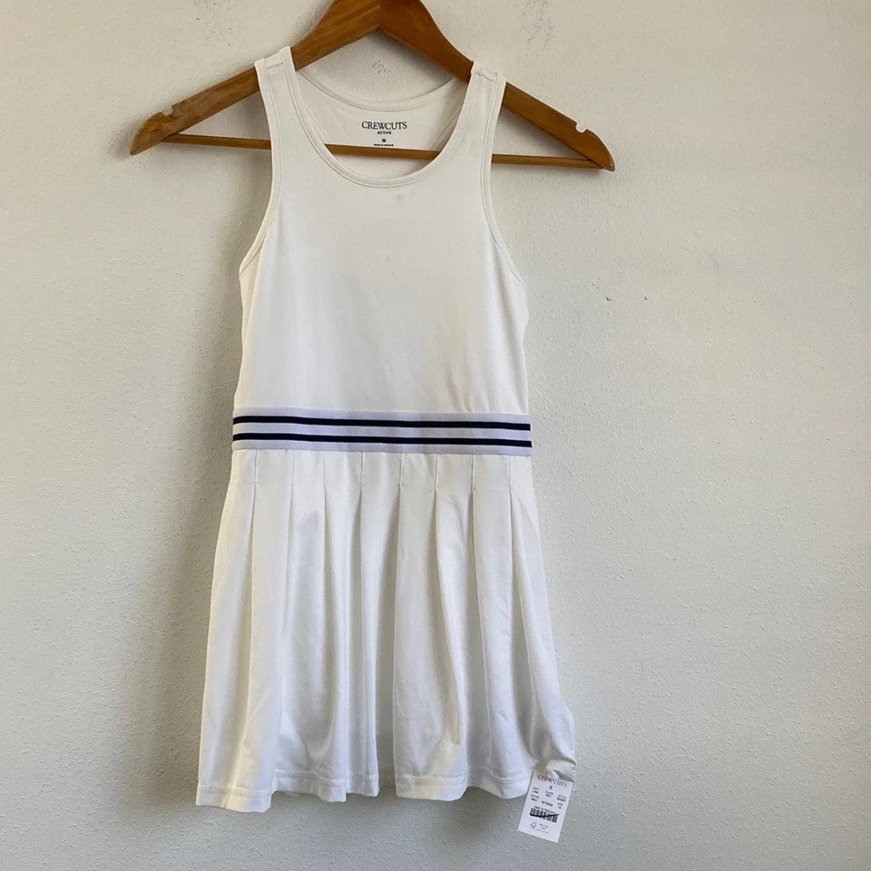 Vestido plisado J Crewcuts para niñas en jersey de rendimiento talla 10 blanco Foto 1 de 4