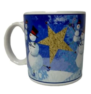 Taza de vacaciones de Navidad Oneida Snow Pals muñeco de nieve estrellas diseños Zulauf Foto 1 de 4