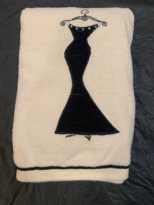 Toalla decorativa negra y crema con silueta de vestido. Estrás 47x21 Foto 1 de 4