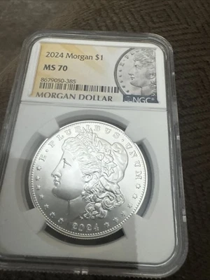 2024 Morgan Silver Dollar. NGC MS70 - Image 1 of 2