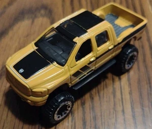 2016 Hot Wheels HT 2007 Dodge Ram 1500 Yellow / Black Pickup Truck Diecast K6137 - Picture 1 of 7