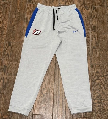 Pantalones deportivos de entrenamiento Depaul Blue Demons para hombre Nike Dri-Fit grandes Foto 1 de 2