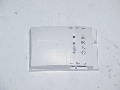 HONEYWELL T8034C1481 HEAT/COOL THERMOSTAT 145879 - Image 1 of 2