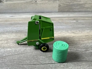 Ertl 1/64 John Deere 566 Round Baler With Plastic Round Bale - Picture 1 of 8