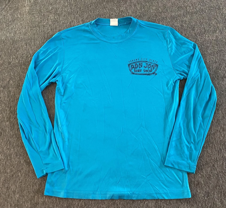 Camisa Ron Jon Surf Shop Juvenil Pequeña Azul Manga Larga Ciudad de Panamá Playa Sport-Tek Foto 1 de 4