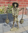 (#1256) brass / bronze ? villager getting water statue  (Pick up, post UK only)