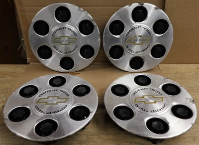 Оригинальный б/у комплект центральных колпаков для фургона Chevrolet Silverado Astro Express Avalanche 15712387 - Изображение 1 из 4
