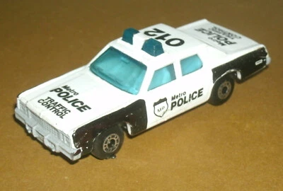 1/64 Scale Plymouth Gran Fury Diecast Metro Police Car - Matchbox SuperFast # 10 - Image 1 of 4