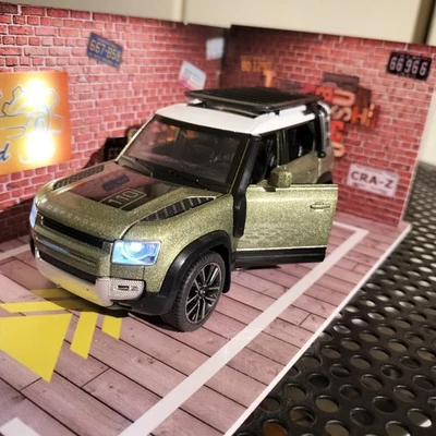 Land Rover Defender 110 Metallic Green with LED Lights Diecast el Car Sound LED - Image 1 of 4