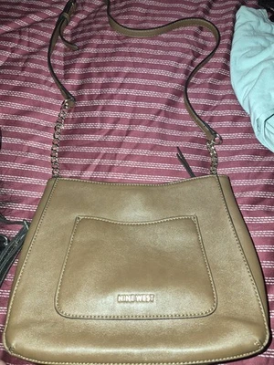 nove bolsas bronzeadas oeste - Imagem 1 de 3