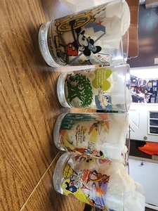 Set Of 4 McDonalds Disney Glasses 100 Years Of Magic Share A Dream Come True - Picture 1 of 2
