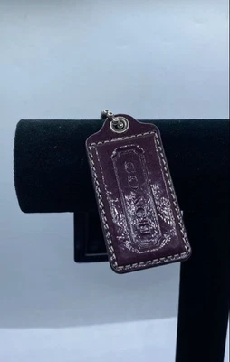 Etiquetas de bolso de cuero azul púrpura Coach 25,0 g Foto 1 de 4