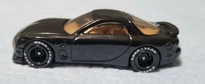 Hot Wheels '95 Mazda RX-7 Real Rider Swap schwarz auf schwarz - Bild 1 von 5