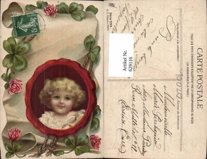 629116,Kind Lockenkopf Portrait Klee Kleeblätter Papierrolle Siegel - Bild 1 von 1