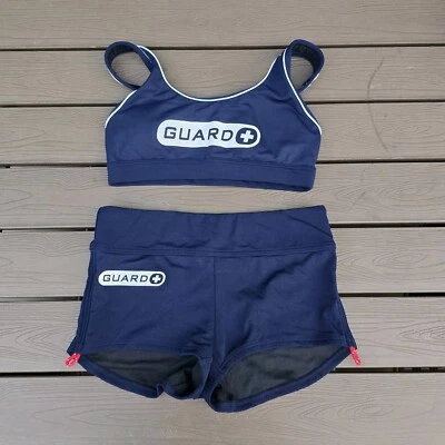 Pantalones Cortos TYR Para Mujer Nylon Azul Marino Salvavidas Entrenamiento Espalda Corredora y Niño Talla S Nueva Muestra Foto 1 de 2