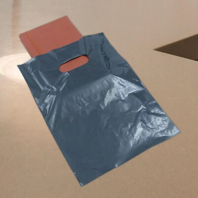 Bolsas de plástico 1000 manijas troqueladas negras para mercancía de compras 9 x 12" troqueladas Foto 1 de 4