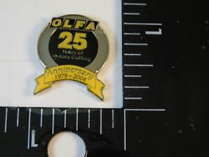 OLFA 25 YEARS OF ROTARY CUTTING ADVERTISEMENT PIN SEWING QUILTING PATCHWORK