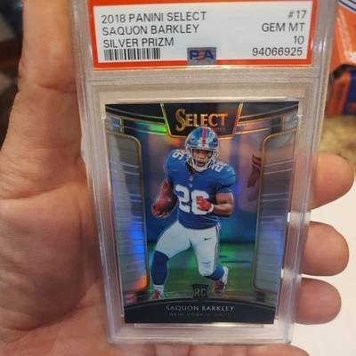 PSA 10 - SAQUON BARKLEY SELECT SILVER PRIZM RC #17 (GIGANTES) GEMA COMO NUEVO Foto 1 de 2