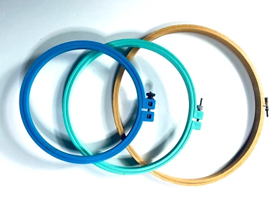 3 Round Embroidery Hoops  9" Wood and a 6" & 7" Plastic Embroidery Hoops - Image 1 of 4