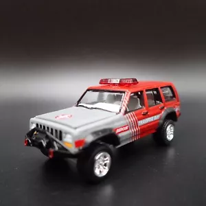 JEEP CHEROKEE XJ TRAVERSE BAY WATER RESCUE W/ HITCH 1:64 SCALE DIECAST MODEL CAR - Picture 1 of 7