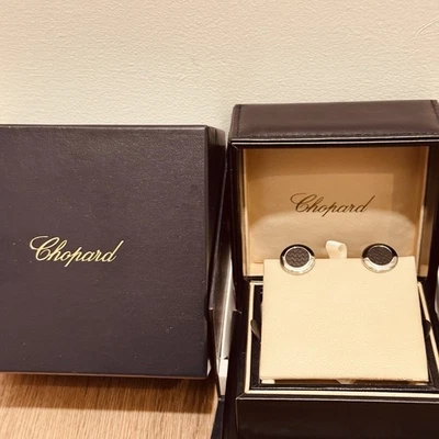 Gemelos Chopard Mille Miglia de acero inoxidable y goma negros y plateados Foto 1 de 4