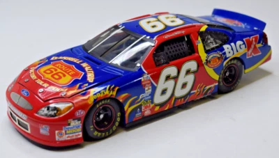 Carro fundido Team Caliber Big K 2000 Ford Taurus Darrell Waltrip #66, 1:24 - Imagem 1 de 4