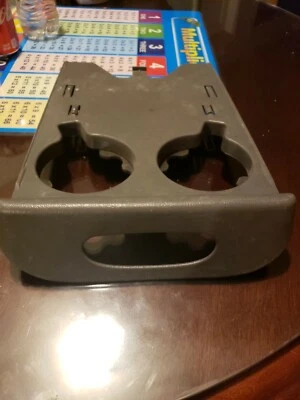 Toyota Tacoma 2003 asiento trasero retráctil portavasos OEM LKQ Foto 1 de 4