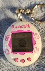 Tamagotchi Gen 2 English White w/ Pink Characters 1996 1997 Bandai Virtual Pet - Picture 1 of 7