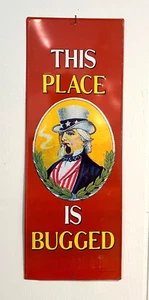 1970s  - THIS PLACE IS BUGGED - 19 inch Tin Litho Sign, Vintage Counter Culture - Picture 1 of 8