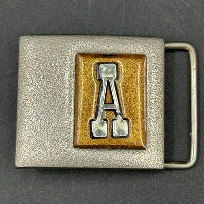 Lee NY EE. UU. Monograma “A” Hebilla de Cinturón Tono Plateado Ámbar Esmalte Retro De Colección Foto 1 de 4