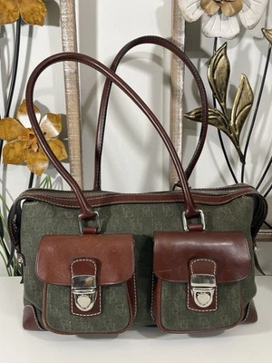 Bolso de mano Dooney & Bourke de colección de lona y cuero verde cazador con detalles de cuero oscuro Foto 1 de 4