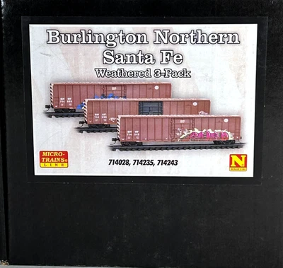 MICRO-TRAINS 3-PK WEATHERED W/GRAFITI 50' RIB SIDE BOX CAR BNSF 98305048 - Image 1 of 4