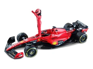 Modellino Ferrari Charles Leclerc SF-23 con figura pilota Scala 1:24 Burago - Foto 1 di 4