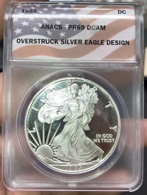 Overstruck Silver Eagle 1985 ANACS PR69 DCAM Daniel Carr Restrike - Imagen 1 de 4