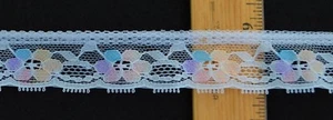 Encaje plano/tejido - 1 1/4" con flores multicolores pastel en paquete blanco - Imagen 1 de 2