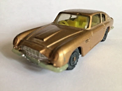 Husky 1:64 diecast ASTON-MARTIN DB6 circa '66-'68; golden-brown metallic paint - image 1 of 4