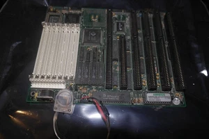 Carte mère 386 baby AT ISA SIMM AMD 386DX-40 MHz CPU fonctionnel dtk PEM-0039N - Photo 1/11