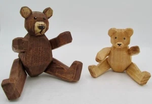 Dos osos de madera tallados a mano con brazos y patas articulados - Imagen 1 de 5