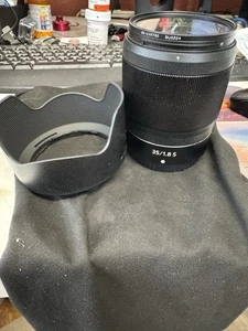 Nikon Nikkor Z 35mm f/1.8 S FX Autofokus Objektiv für Z-Mount, schwarz, mit Kappen/Kapuze - Bild 1 von 3