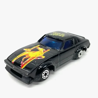 Coche de juguete diecast vintage negro Datsun Wild Horse 701 3" Foto 1 de 4