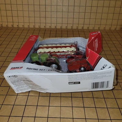 ERTL 1/64th Case IH 4 Piece Haying Set 44078 NEW DAMAGE BOX - Image 1 of 4