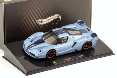 1:43 Hot Wheels Elite Ferrari FXX Bleu Clair/ Rayure Bleue N5611 - Photo 1/3