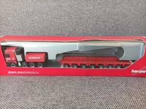 Herpa 1:87 in confezione originale - 148528 MB Actros Titan treno rimorchio a pianale ribassato "Scholpp" - Foto 1 di 12