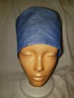 Light blue demin color with small specks of gold color.  SURGICAL SCRUB CAP