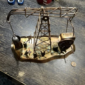 Kupferdose Ölplattform Spieluhr. Funktioniert gut.  Spielt gelbe Rose von Texas - Bild 1 von 7